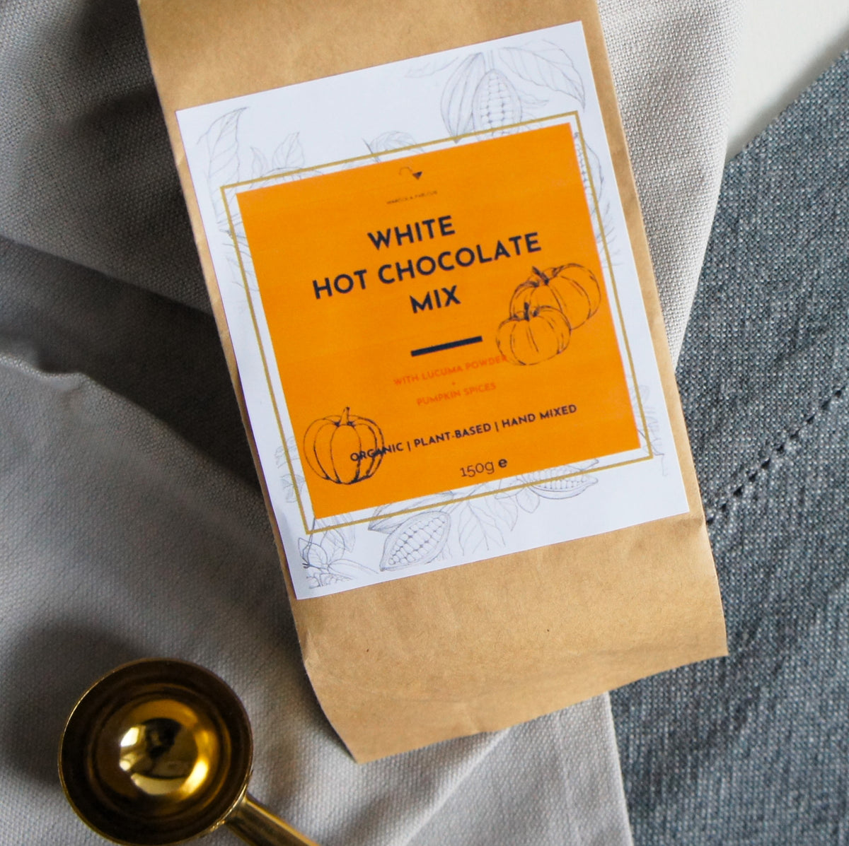 A bag of vegan Pumpkin Spice White Hot Chocolate Blend 