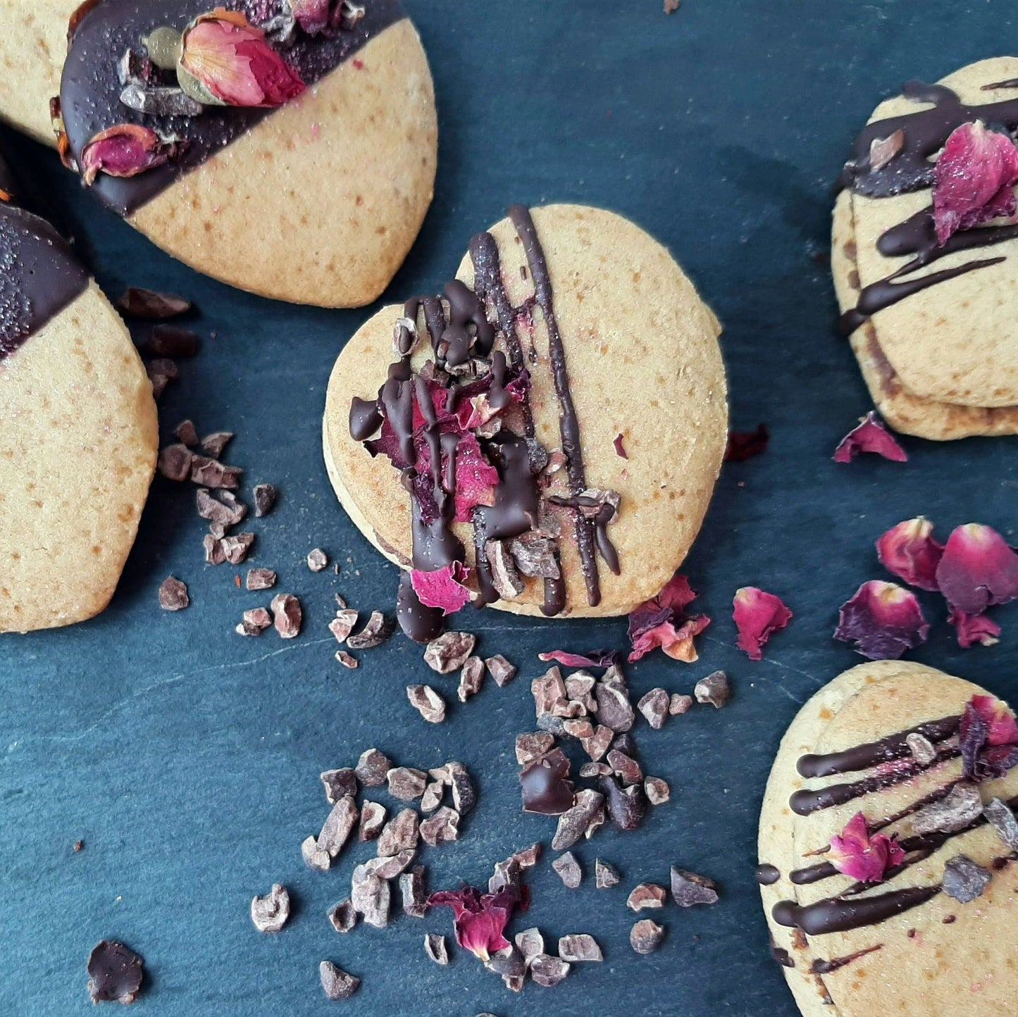 Decorative vegan heart cookies with chocolate slate blue surface