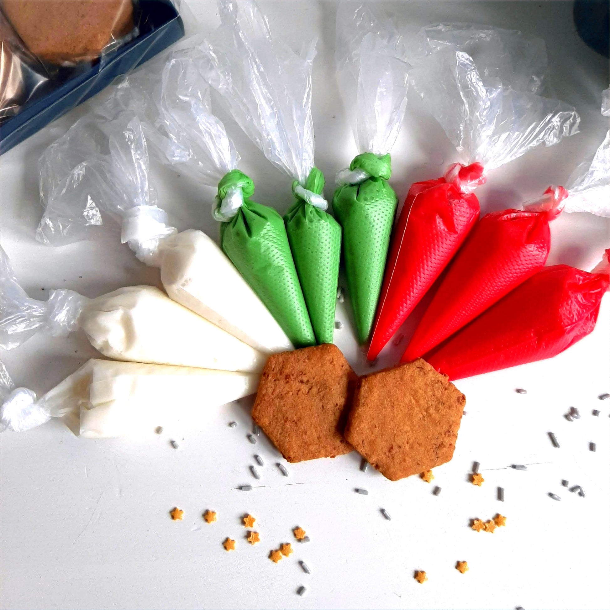 Gluten free cookie decorating kit with packaged icing on a white surface